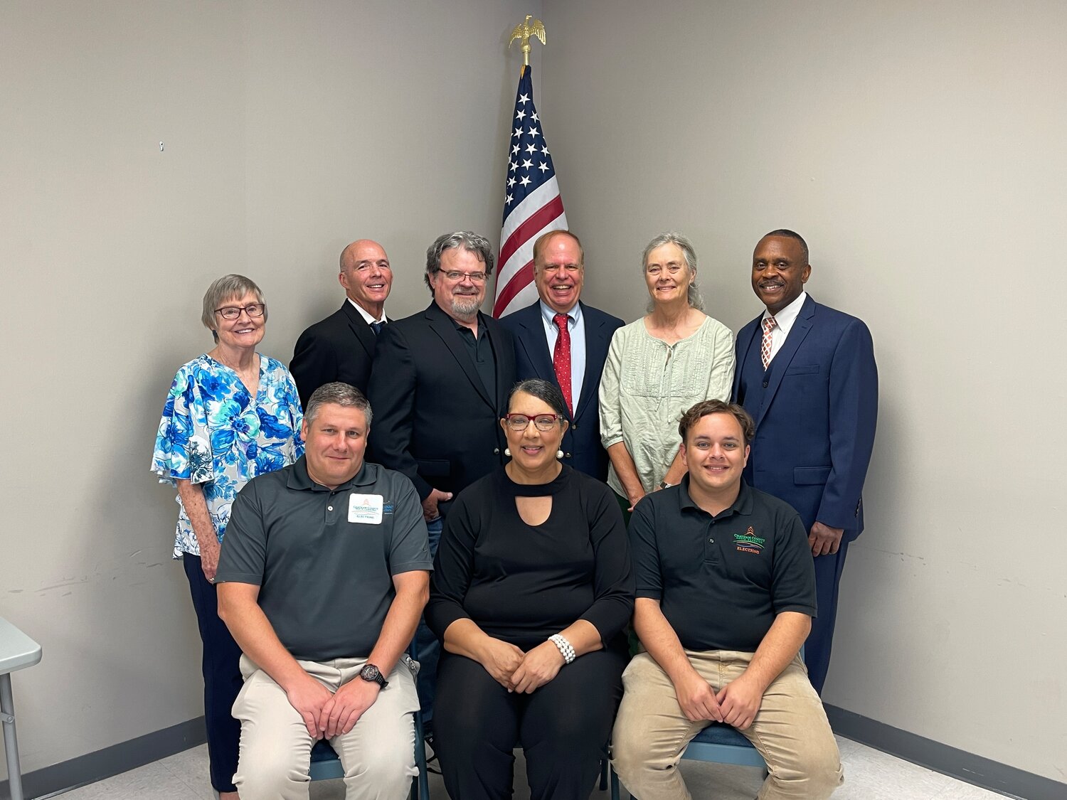 First row from left to right, Deputy Director Steve Simos, Director Pandora Paschal, and Election Specialist Chance Mashburn pose with Chatham Board of Election members (back row left to right) Erika Lindemann, Secretary Frank Dunphy, Mark Barroso, Bob Tyson, Chair Laura Heise, and N.C. House Rep. Robert Reives II (D-Dist.54).